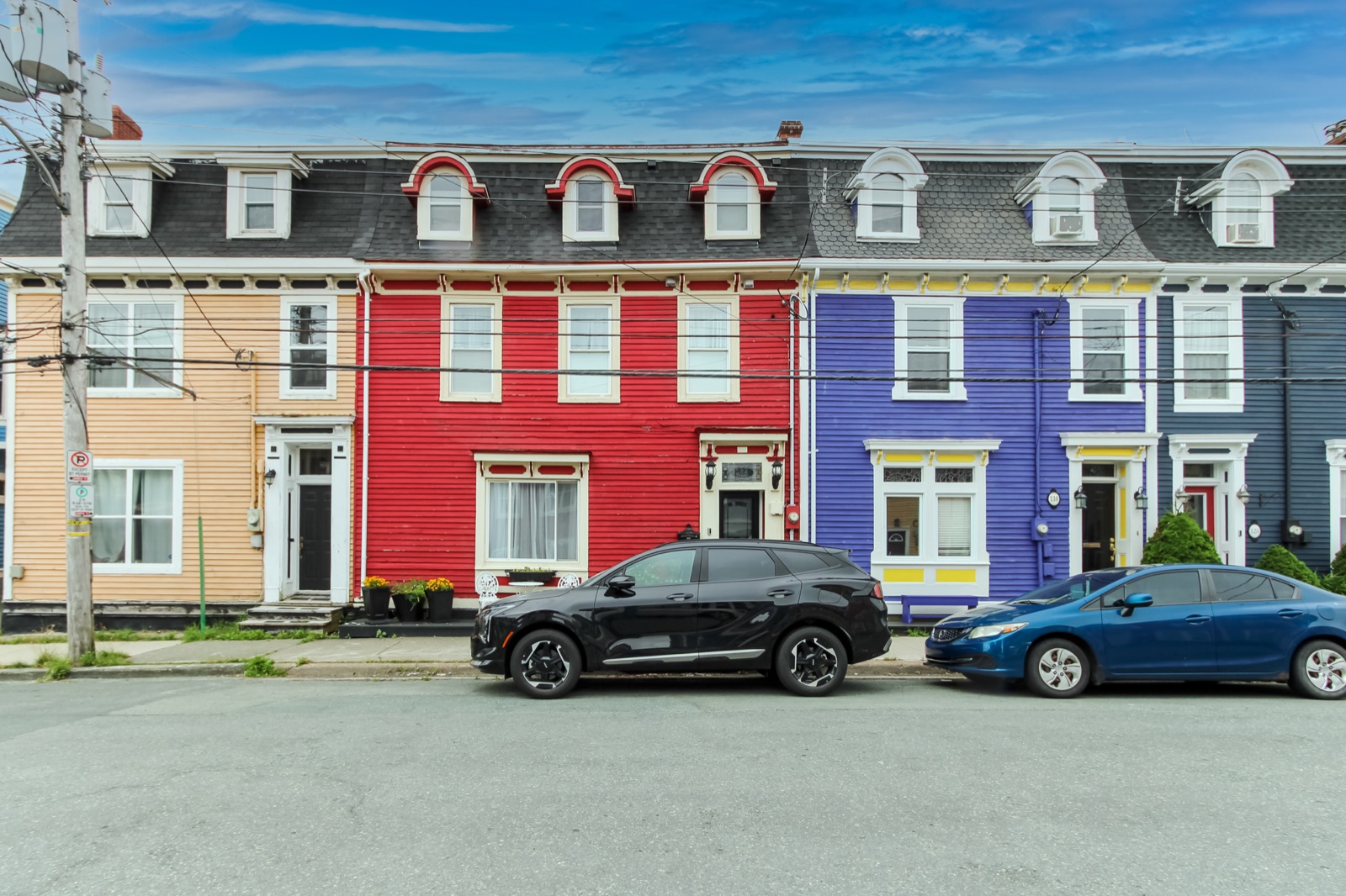Colourful Gower Street streetscape with 132 Gower, the red house, at centre