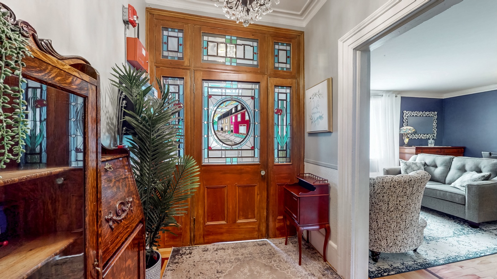 Stained-glass front entry and original woodwork