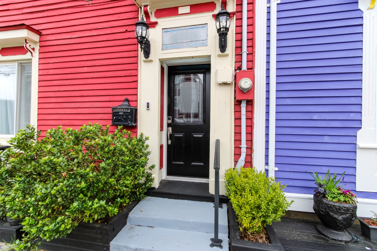 Black front door of 132 Gower Street